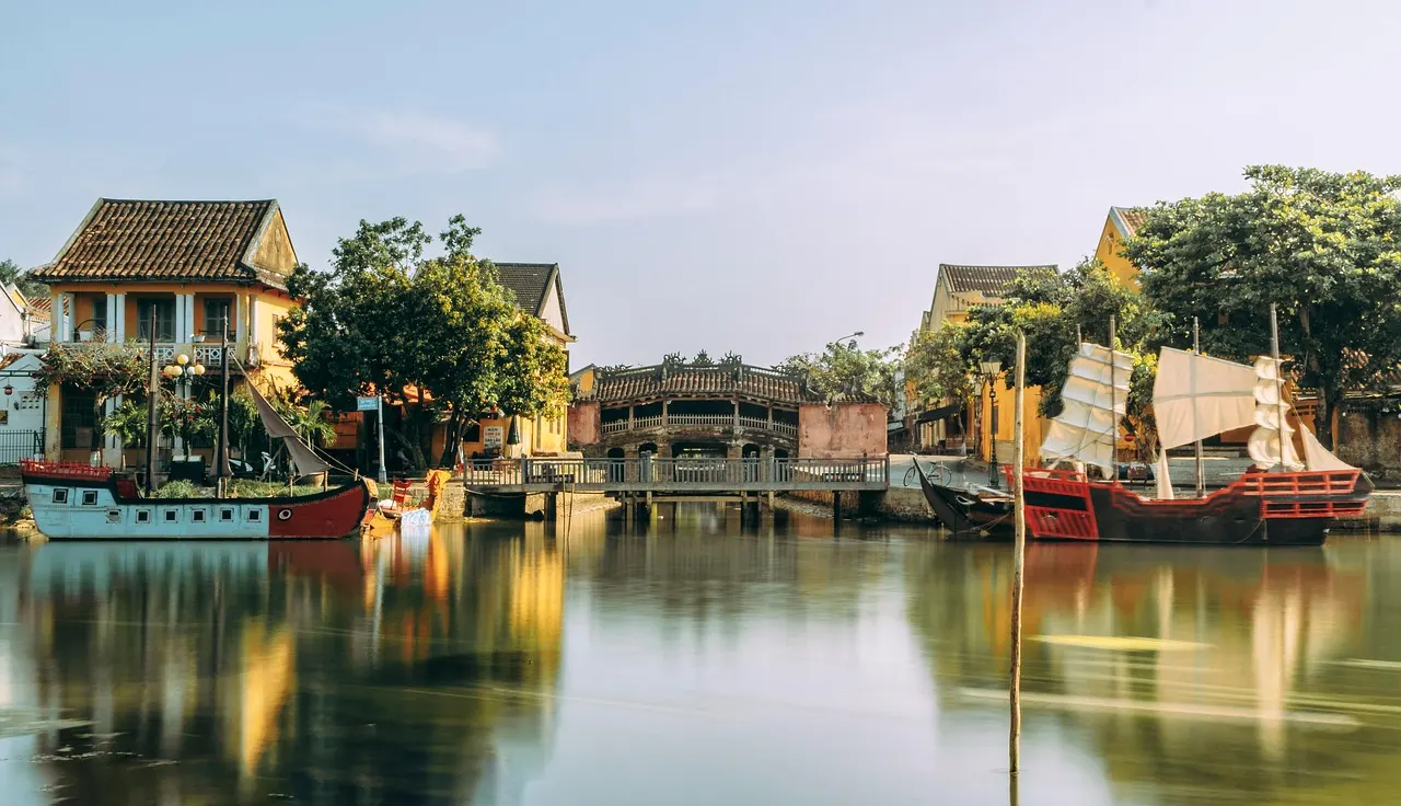 A spectacular scene from the Hoi An Memories Show, featuring vibrant costumes and dynamic performances that bring the history of Hoi An to life