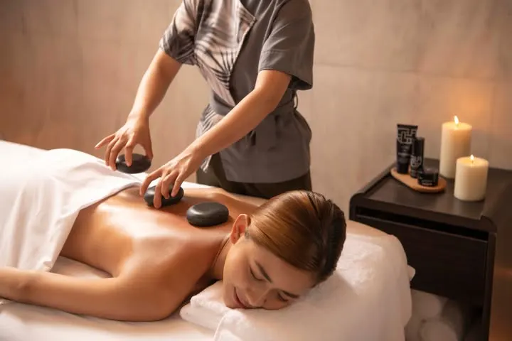 Relaxing spa treatment at a luxury wellness resort in Vietnam, surrounded by tropical greenery and tranquil ambiance.